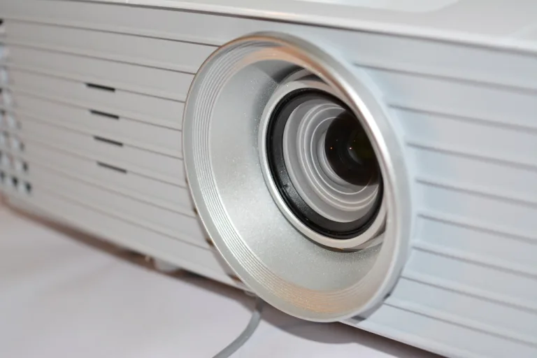 Close-up of a white digital projector lens